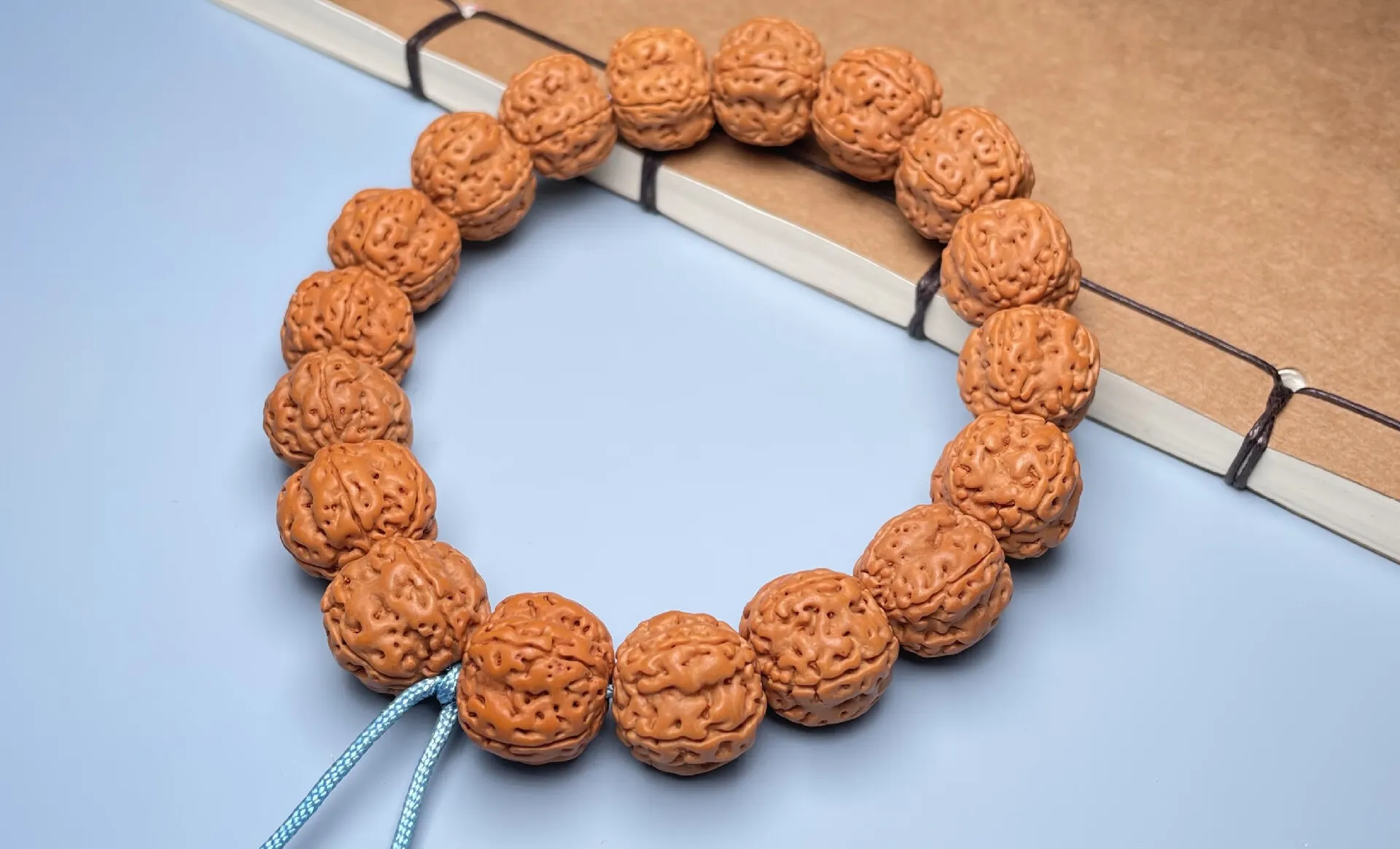 Crafting Rudraksha bracelets for men, blending spirituality and stylish design.